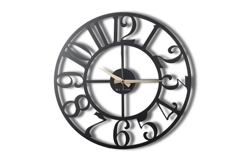 Dekorativ Metallväggklocka - Svart - Inredning & dekor - Dekor & inredningsdetaljer