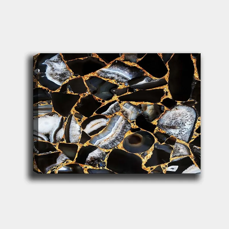 Canvastavla 70x100 cm - Abstrakt konstverk med mönster av svarta och grå stenar med guldiga inslag, Svart / Grå / Guld