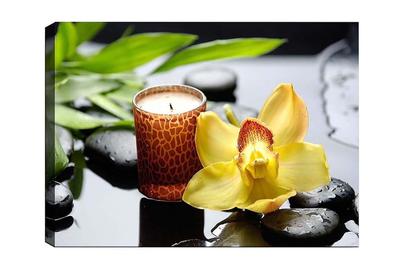 Canvastavla 70x100 cm - Elegant orkidéblomma i gult med en doftljus och svarta stenar i en harmonisk komposition, Gul / Svart / Grön