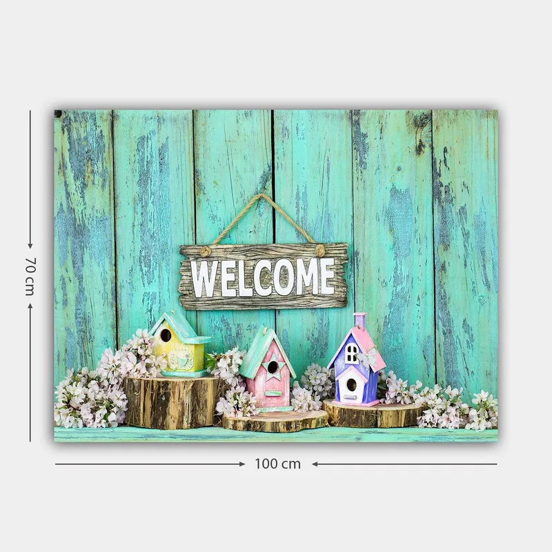 Canvastavla 70x100 cm - Färgglada fågelholkar i en välkomnande miljö med en träskylt - Turkos / Rosa / Gul - Inredning & dekor - Tavlor & konst - Canvastavla