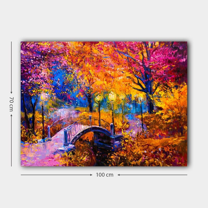 Canvastavla 70x100 cm - Färgsprakande höstscen med en bro som sträcker sig över en stilla vattenyta, omgiven av träd i varma höstfärger - Orange / Lila / Gult - Inredning & dekor - Tavlor & konst - Canvastavla