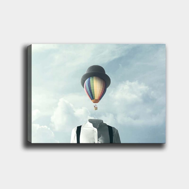 Canvastavla 70x100 cm - Huvudlös man i vit skjorta och svart hatt, med en färgglad luftballong svävande ovanför - Vit / Svart / Regnbågsfärgad - Inredning & dekor - Tavlor & konst - Canvastavla