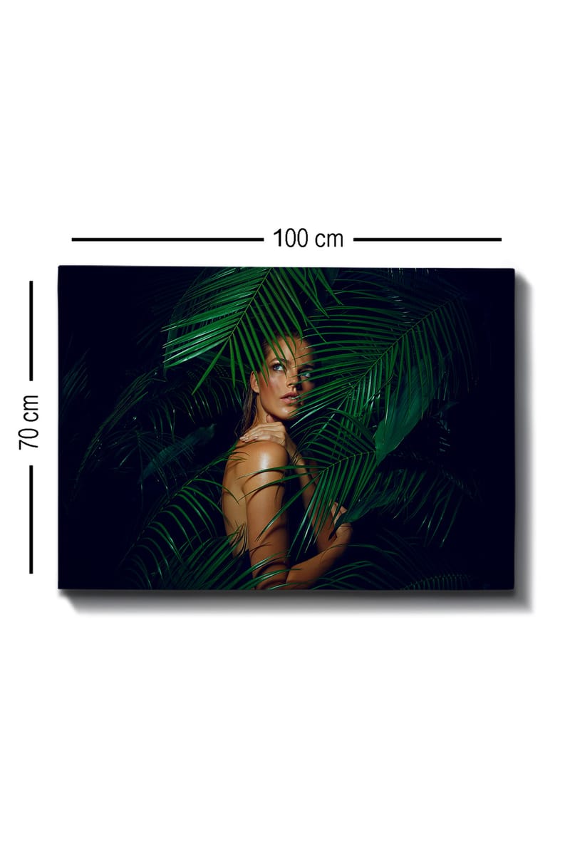 Canvastavla 70x100 cm - Kvinna delvis dold bakom gröna palmblad - Mörkgrön / Ljusgrön / Beige - Inredning & dekor - Tavlor & konst - Canvastavla