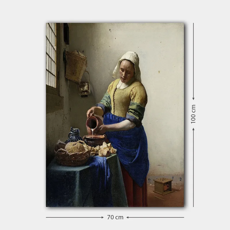 Canvastavla 70x100 cm - Kvinna som häller mjölk i en skål i ett ljust kök - Blå / Gul / Brun - Inredning & dekor - Tavlor & konst - Canvastavla