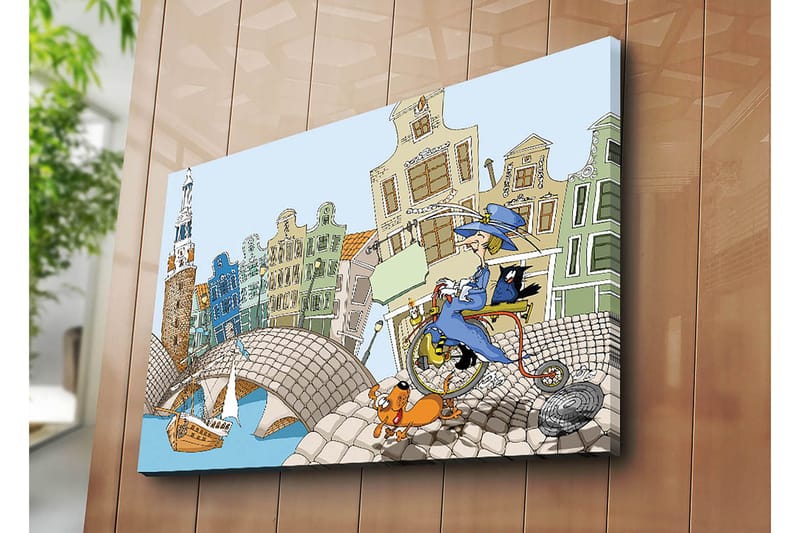 Canvastavla 70x100 cm - Kvinna på en cykel med en hund och en katt, omgiven av färgglada hus och en bro - Blå / Grön / Orange - Inredning & dekor - Tavlor & konst - Canvastavla