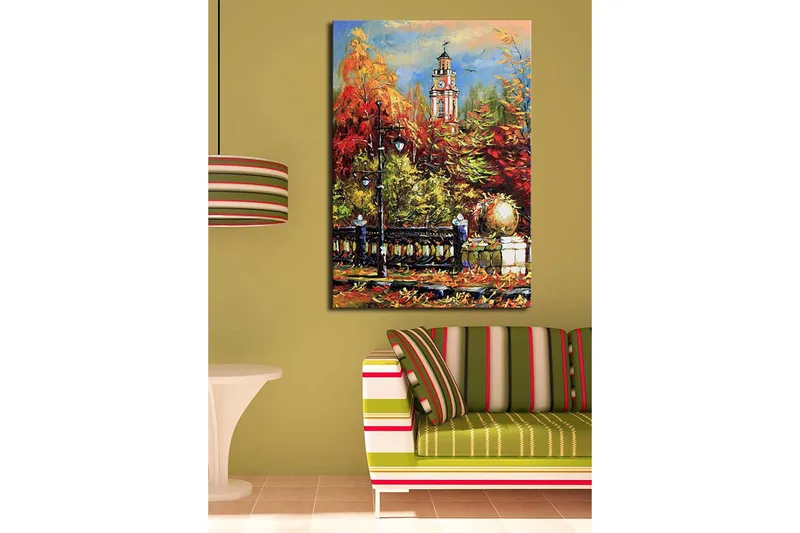 Canvastavla 70x100 cm - Livlig höstscen med en klocktorn i bakgrunden omgiven av färgglada träd och lampor - Röd / Orange / Grön - Inredning & dekor - Tavlor & konst - Canvastavla