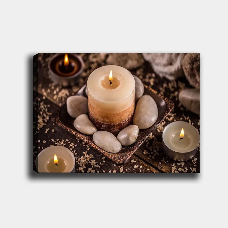 Canvastavla 70x100 cm - Lugn och avkopplande komposition med levande ljus och stenar i en harmonisk miljö, Beige / Brun / Grå