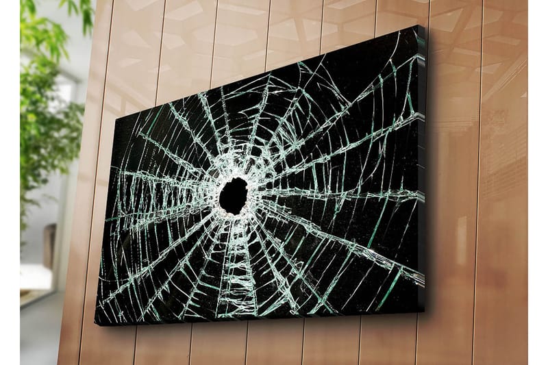 Canvastavla 70x100 cm - Närbild av en sprucken glasruta med ett centralt hål och sprickor som sträcker sig utåt - Svart / Genomskinlig - Inredning & dekor - Tavlor & konst - Canvastavla