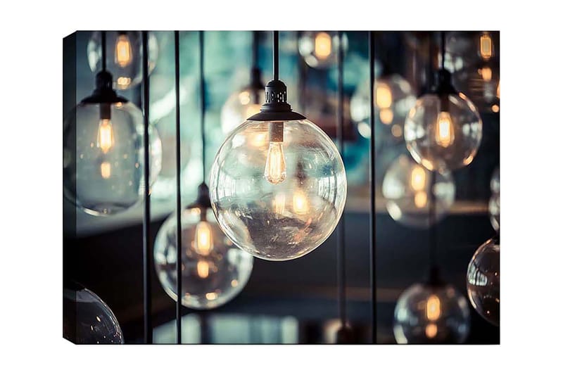 Canvastavla 70x100 cm - Samling av hängande glödlampor i olika storlekar som skapar en atmosfär av värme och ljus, Klar / Svart / Guld