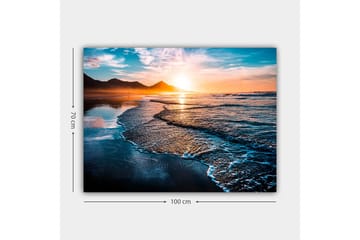 Canvastavla 70x100 cm - Solnedgång över en strand med mjuka vågor som rullar in mot kusten - Blå / Orange / Turkos - Inredning & dekor - Tavlor & konst - Canvastavla