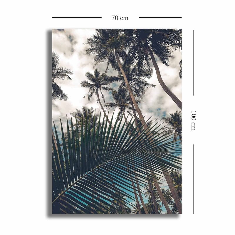 Canvastavla 70x100 cm - Tropisk palmlund med en stor palmblad i förgrunden - Mörkgrön / Ljusgrön / Blå - Inredning & dekor - Tavlor & konst - Canvastavla