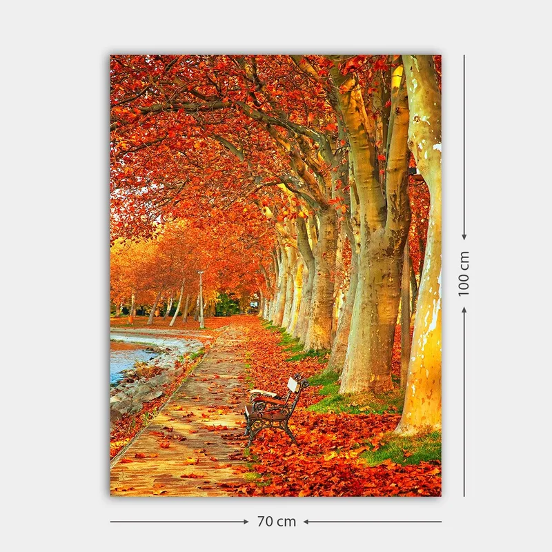 Canvastavla 70x100 cm - Vacker höstscen med en bänk längs en allé av träd med sprakande röda och orange löv - Röd / Orange / Gul - Inredning & dekor - Tavlor & konst - Canvastavla