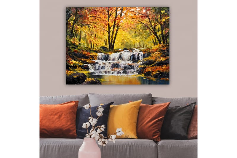 Canvastavla 70x100 cm - Vacker höstscen med ett porlande vattenfall omgiven av färgglada träd i gult och orange - Gult / Orange / Brunt - Inredning & dekor - Tavlor & konst - Canvastavla