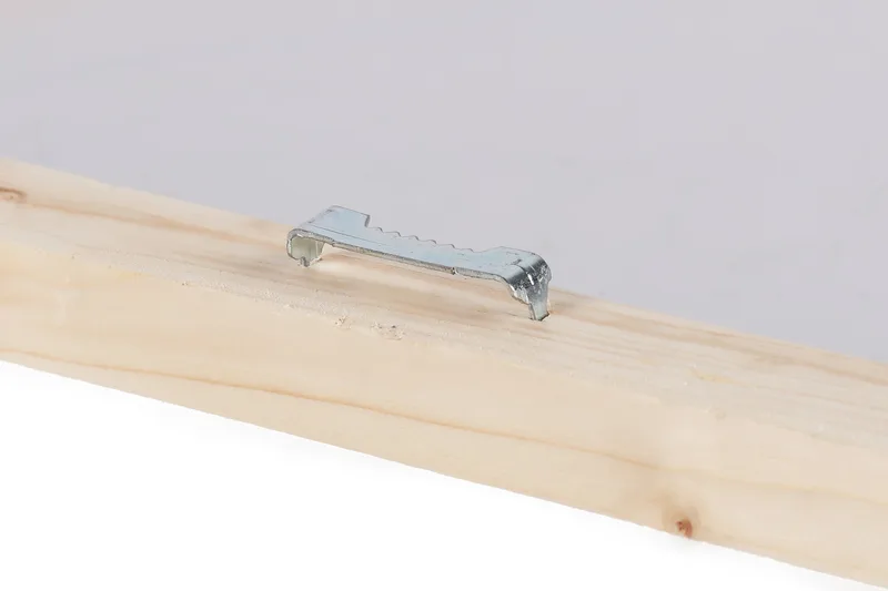 Canvastavla 70x100 cm - Vacker kustlinje med färgglada hus som klättrar uppför en grönskande kulle vid en strand - Blå / Grön / Gul - Inredning & dekor - Tavlor & konst - Canvastavla