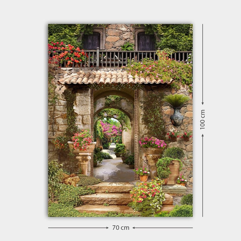 Canvastavla 70x100 cm - Vacker och grönskande trädgård med blomsterarrangemang och en stenbåge som leder in i en lummig gång - Grön / Rosa / Beige - Inredning & dekor - Tavlor & konst - Canvastavla