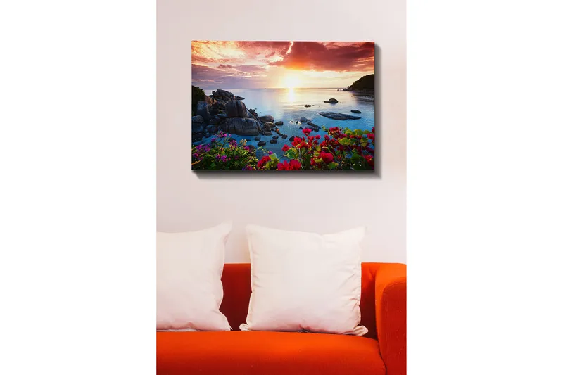 Canvastavla 70x100 cm - Vacker solnedgång över havet med klippor och färgglada blommor i förgrunden - Rosa / Blå / Orange - Inredning & dekor - Tavlor & konst - Canvastavla