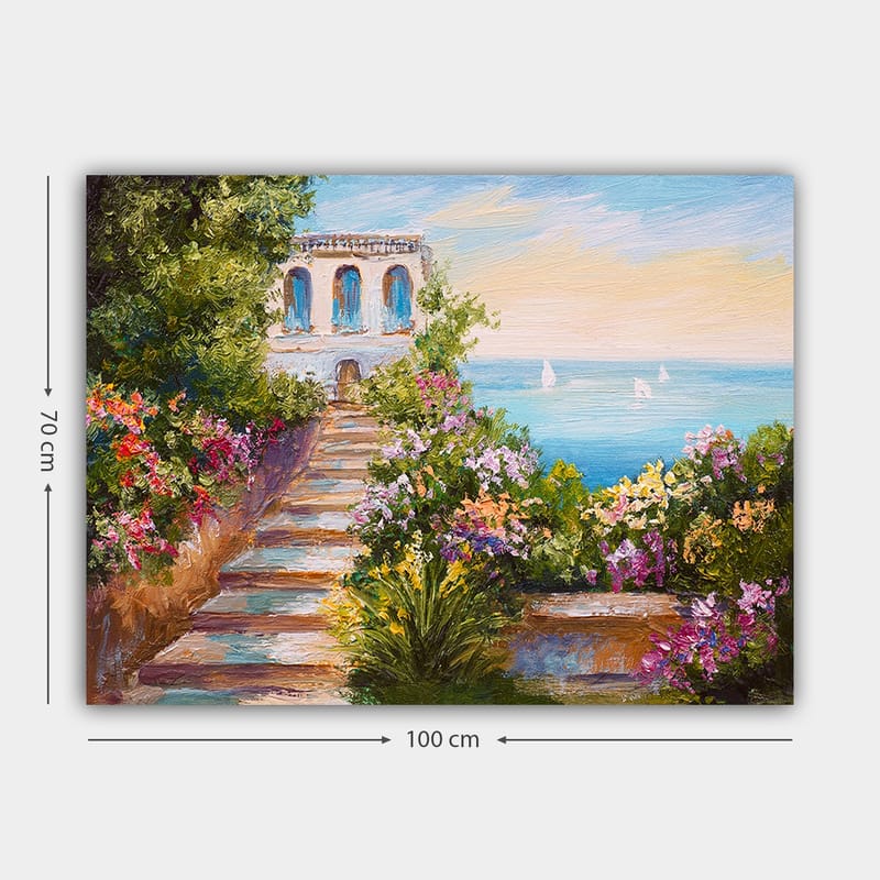 Canvastavla 70x100 cm - Vacker trappa omgiven av färgglada blommor som leder ner till havet och en byggnad med blå fönster - Grön / Rosa / Blå - Inredning & dekor - Tavlor & konst - Canvastavla