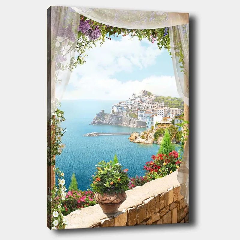 Canvastavla 70x100 cm - Vacker utsikt över en kuststad med färgglada hus och blomstrande växter, sedd genom en öppen fönsteröppning - Blå / Grön / Vit - Inredning & dekor - Tavlor & konst - Canvastavla