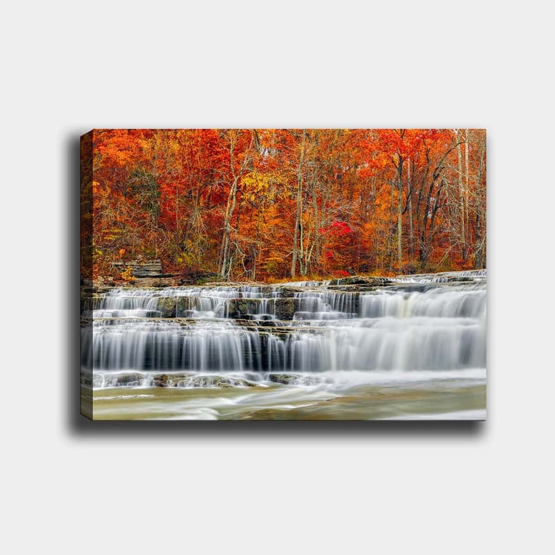 Canvastavla 70x100 cm - Vacker vattenfallsscen omgiven av höstfärger i röd och orange nyans - Röd / Orange / Grå - Inredning & dekor - Tavlor & konst - Canvastavla