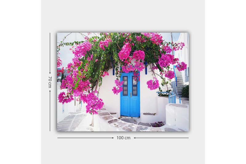 Canvastavla 70x100 cm - Vacker vit byggnad med en blå dörr omgiven av lila blommor - Lila / Blå / Grön - Inredning & dekor - Tavlor & konst - Canvastavla