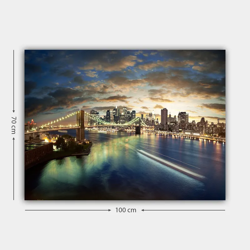 Canvastavla 70x100 cm - Vacker vy över en stad med en bro som sträcker sig över en glittrande flod vid skymning - Blå / Grön / Orange - Inredning & dekor - Tavlor & konst - Canvastavla