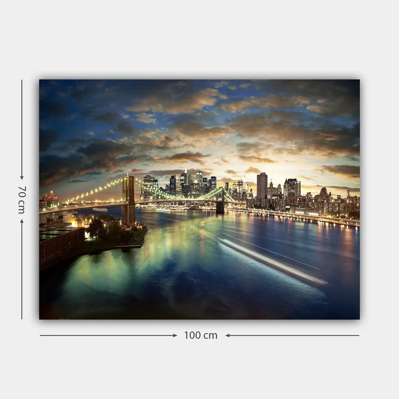 Canvastavla 70x100 cm - Vacker vy över en stad med en bro som sträcker sig över en glittrande flod vid skymning - Blå / Grön / Orange - Inredning & dekor - Tavlor & konst - Canvastavla