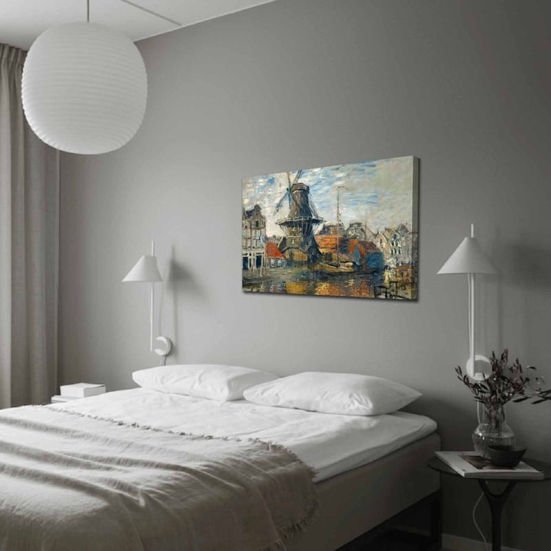 Canvastavla 70x100 cm - Vindmolle vid en vattenspegel omgiven av pittoreska byggnader, Blå / Grön / Orange