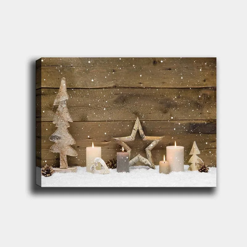 Canvastavla 70x100 cm - Vinterlig dekoration med ljus, träd och stjärnor på en snötäckt yta, Vit / Grå / Brun
