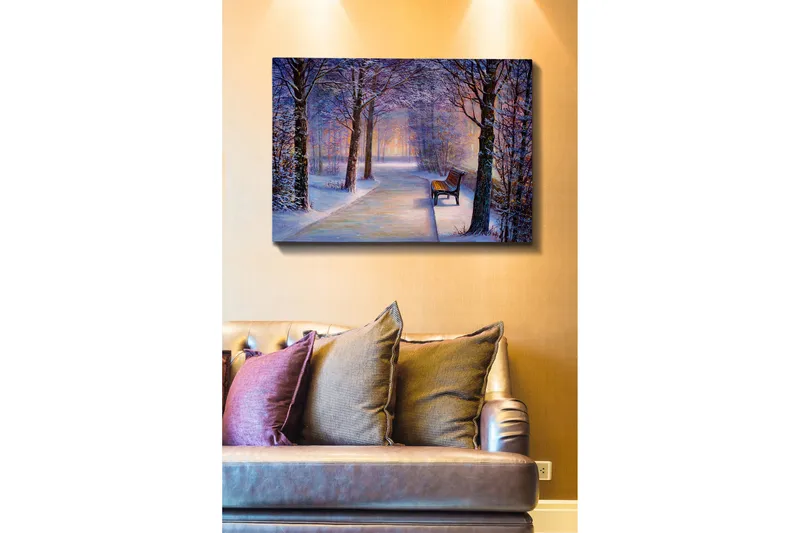 Canvastavla 70x100 cm - Vinterpromenad med snötäckta träd och en ensam bänk längs en stig, Blå / Vit / Grå