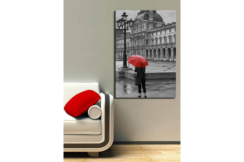 Canvastavla 70x100 cm - Person står med ett rött paraply i en regnig stadsmiljö framför en historisk byggnad - Röd / Svart - Inredning & dekor - Tavlor & konst - Canvastavla