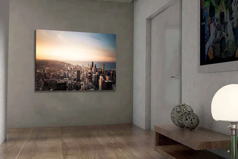 Canvastavla 70x100 cm - Panoramavy av en stad med höga skyskrapor och en solnedgång som skapar en dramatisk atmosfär - Blå / Orange / Grå - Inredning & dekor - Tavlor & konst - Canvastavla