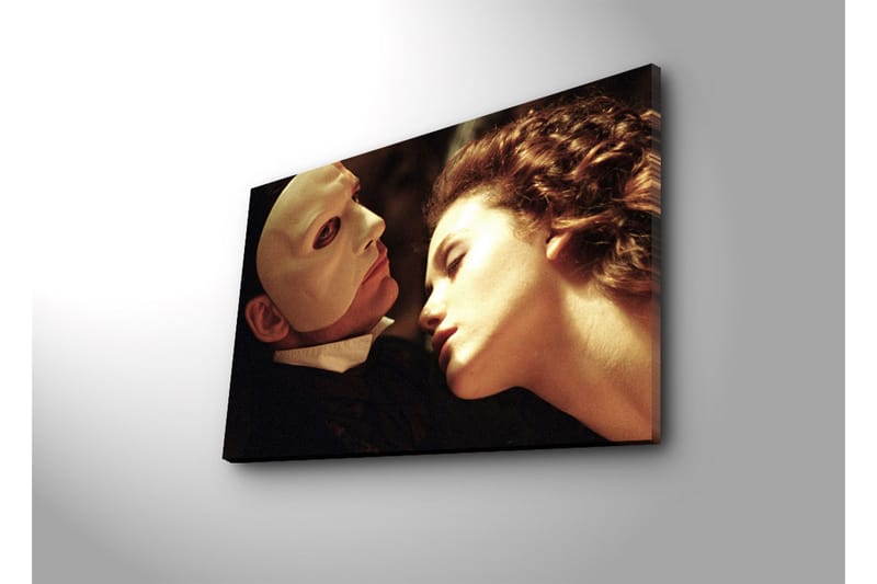 Canvastavla 70x45 cm - Intensiv känslomässig scen mellan två personer med fokus på en maskerad man och en kvinna - Hudton / Vit / Svart - Inredning & dekor - Tavlor & konst - Canvastavla