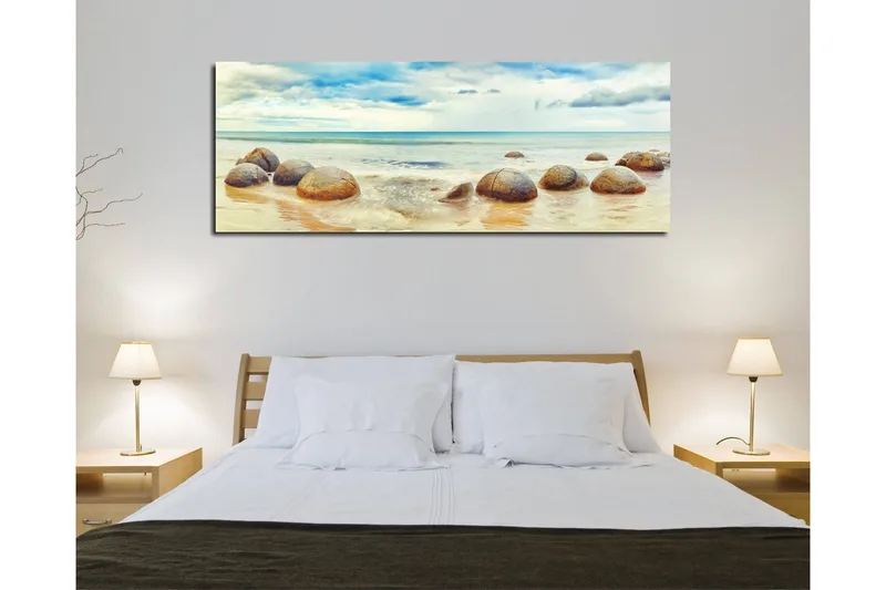 Canvastavla 80x30 cm - Runda stenar vid en strand med hav och himmel i bakgrunden - Blå / Beige / Grå - Inredning & dekor - Tavlor & konst - Canvastavla