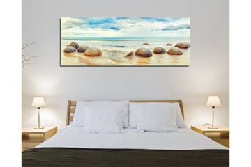 Canvastavla 80x30 cm - Runda stenar vid en strand med hav och himmel i bakgrunden - Blå / Beige / Grå - Inredning & dekor - Tavlor & konst - Canvastavla