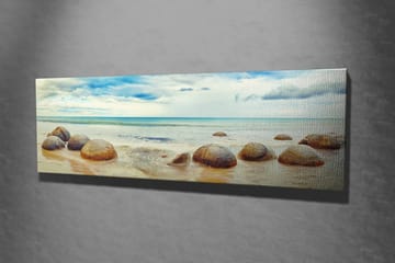 Canvastavla 80x30 cm - Runda stenar vid en strand med hav och himmel i bakgrunden - Blå / Beige / Grå - Inredning & dekor - Tavlor & konst - Canvastavla