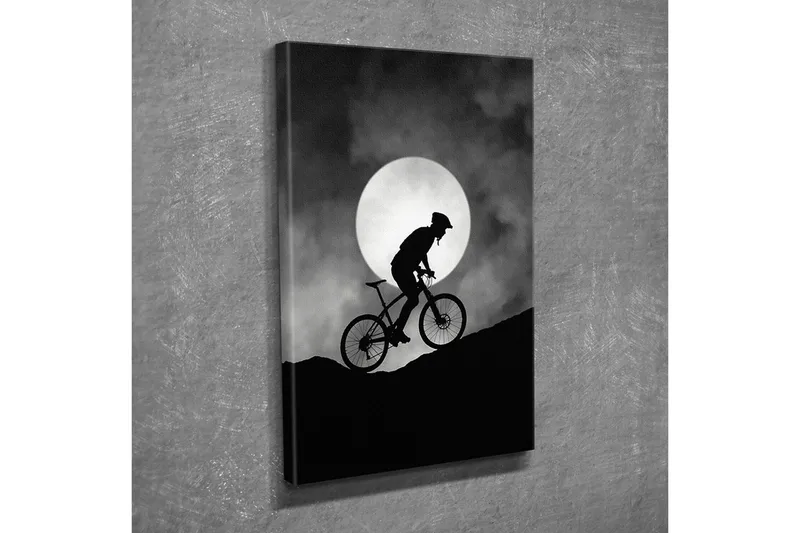 Canvastavla - Cyklist som klättrar uppför en kulle under en stor måne - Svart / Grå - Inredning & dekor - Tavlor & konst - Canvastavla