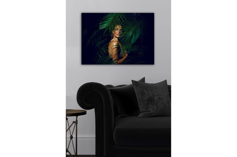 Canvastavla - Kvinna delvis dold bakom gröna palmblad - Mörkgrön / Hudton / Svart - Inredning & dekor - Tavlor & konst - Canvastavla
