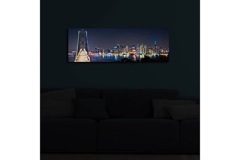 Canvastavla med LED-belysning 30x90 cm - Nattlig stadsbild med en bro och silhuetter av skyskrapor - Mörkblå / Ljusgrön / Vit - Inredning & dekor - Tavlor & konst - Canvastavla