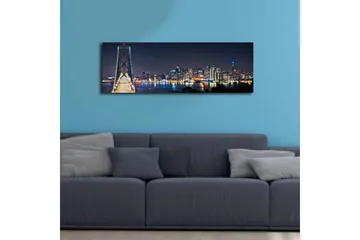 Canvastavla med LED-belysning 30x90 cm - Nattlig stadsbild med en bro och silhuetter av skyskrapor - Mörkblå / Ljusgrön / Vit - Inredning & dekor - Tavlor & konst - Canvastavla