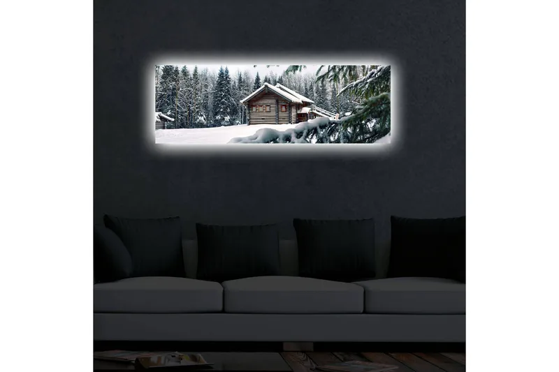 Canvastavla med LED-belysning 30x90 cm - Vinterlandskap med en stuga omgiven av snö och granar - Vit / Grön / Brun - Inredning & dekor - Tavlor & konst - Canvastavla