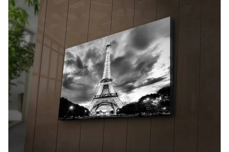 Canvastavla med LED-belysning 45x70 cm - Dramatisk fotobild över upptänt Eiffeltorn i Paris med molnhimmel i svartvit - Svart / Vit - Inredning & dekor - Tavlor & konst - Canvastavla