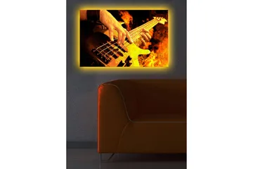 Canvastavla med LED-belysning 45x70 cm - Gitarrist som spelar en elbas omgiven av eldiga flammor - Orange / Svart / Gult - Inredning & dekor - Tavlor & konst - Canvastavla
