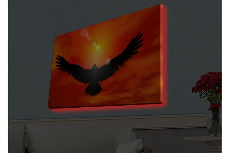 Canvastavla med LED-belysning - Silhuett av en örn som flyger mot en solnedgång i starka färger - Röd / Svart / Orange - Inredning & dekor - Tavlor & konst - Canvastavla