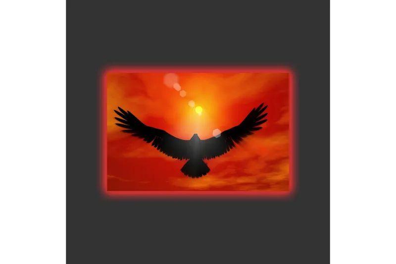 Canvastavla med LED-belysning - Silhuett av en örn som flyger mot en solnedgång i starka färger - Röd / Svart / Orange - Inredning & dekor - Tavlor & konst - Canvastavla