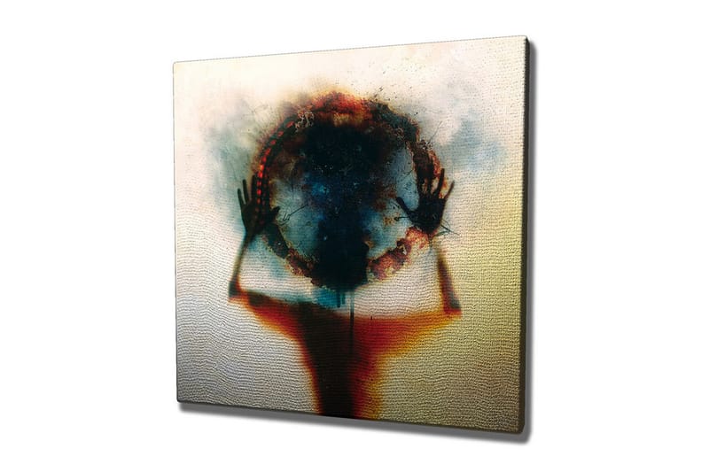 Canvastavla - Silhuett av en person som håller en cirkel av färg och ljus, Svart / Blå / Röd