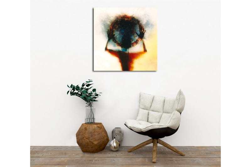 Canvastavla - Silhuett av en person som håller en cirkel av färg och ljus - Svart / Blå / Röd - Inredning & dekor - Tavlor & konst - Canvastavla