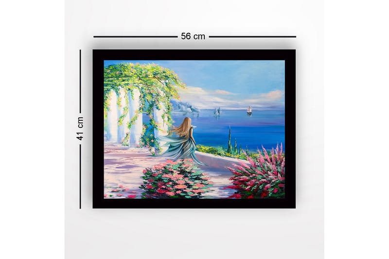 Inramad Canvastavla i trä - 41x56 cm - Kvinna i blå klänning som blickar ut över havet med blommor i förgrunden - Blå / Grön / Rosa - Inredning & dekor - Tavlor & konst